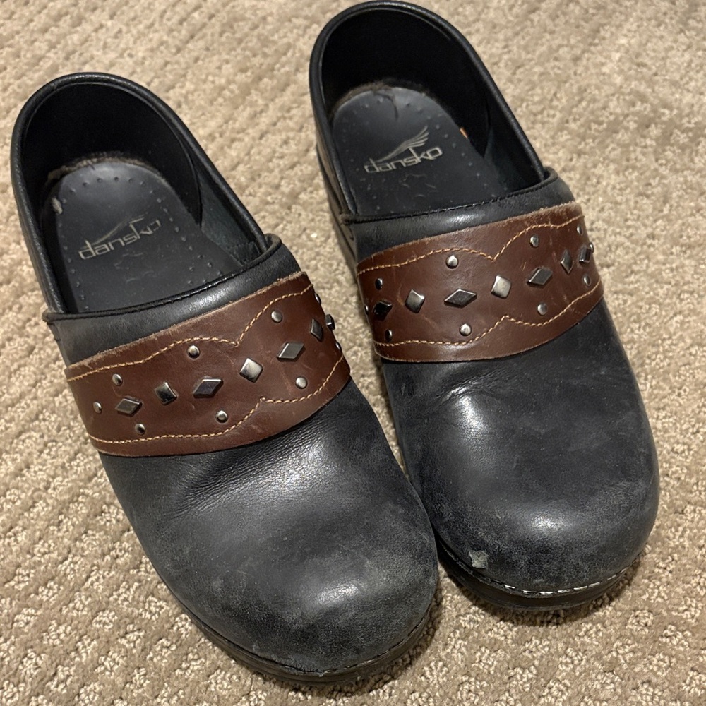 Dansko Black and Brown clogs